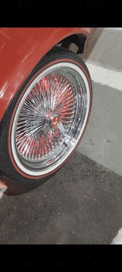 20 inch chrome dating wire wheels with the red Vogue s
