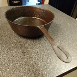 3 LEG  12". X. 3" DEEP CAST IRON. 70 BUCKS OR MAKE OFFER