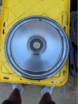 This is a vintage 15-inch hubcap designed for a 1(contact info removed) Chrysler Cordoba
