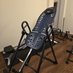 Teeter Hang Up Machine