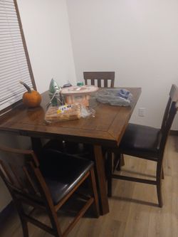 Table set three chairs