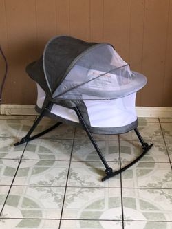 PRACTICALLY NEW PORTABLE BABY BASSINET!!!!
