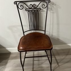 Steel frame dining chairs, real leather cushions
