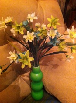 Unique vase filled with flowers