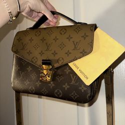 Louis Vuitton Monogram Reverse Canvas Purse