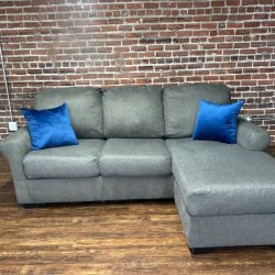 Delivery Available gray Ashley couch with reversible chaise