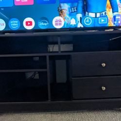 Dark wood tv stand
