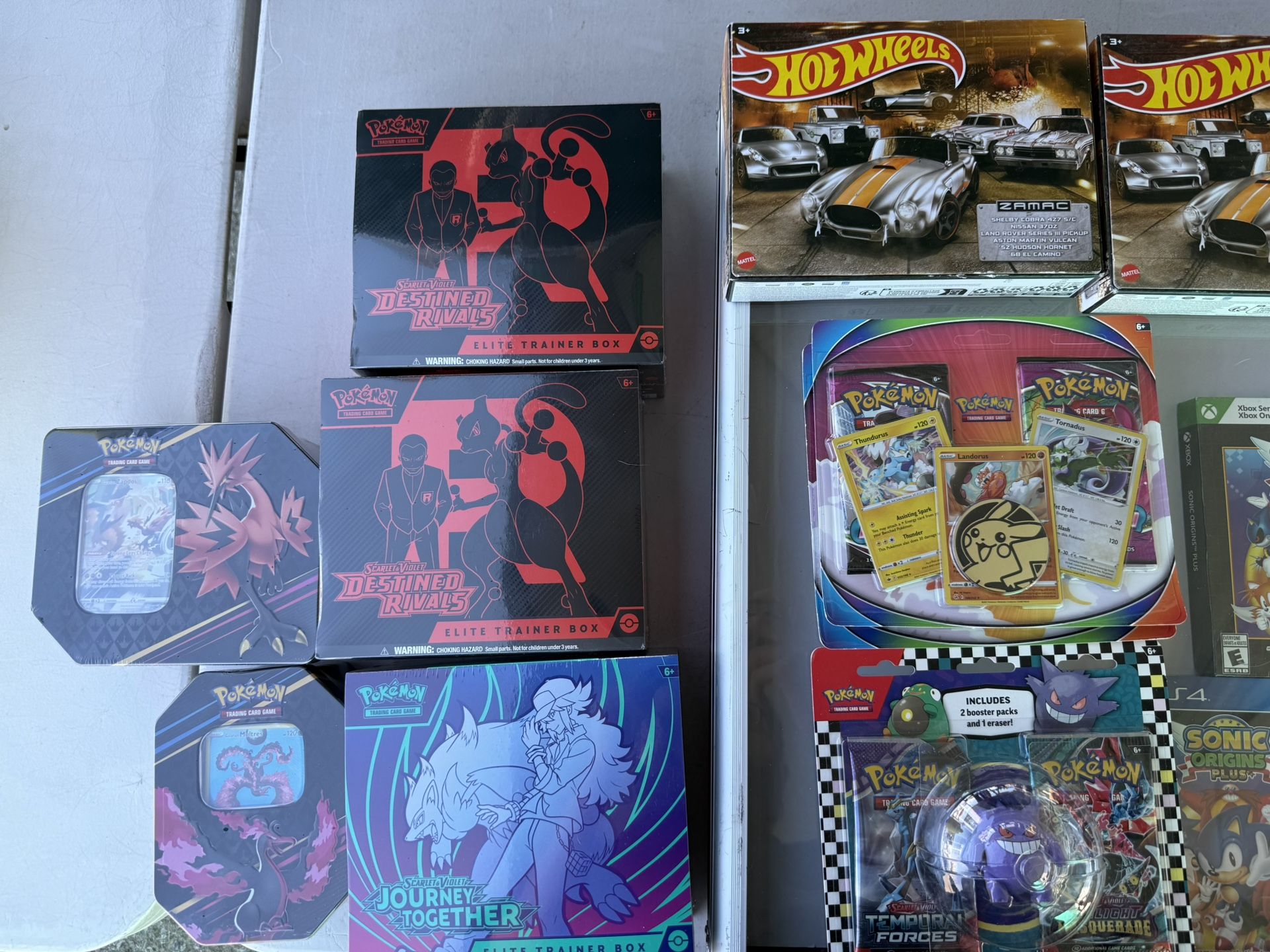 Pokemon ETB’s Tins