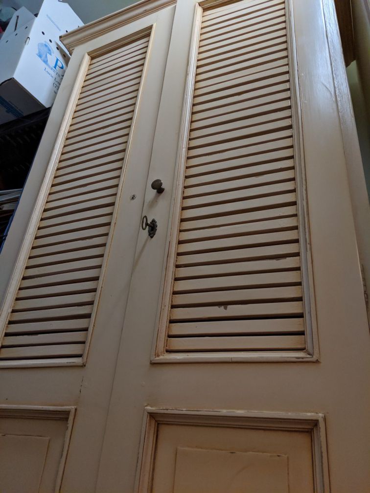 Nadeau Tall Hardwood Cabinet