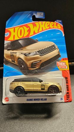 Hot Wheels Gold Range Rover Velar Then and Now. Package slightly damaged in storage