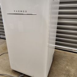 Small Retro Stlye Fridge With Freezer Section.