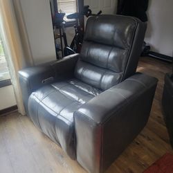 Black Power Recliner with Power Headrest height 46" lenghth 32" width 24"
