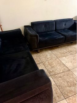 Two blue sofas