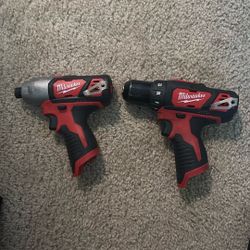Milwaukee Driver & Impact Drill With Charger And 2 Battery Packs
