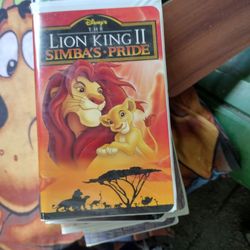 12 VHS Tapes And VHS Player 