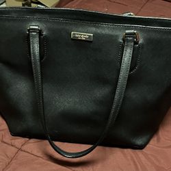 black tote bag by Kate Spade.