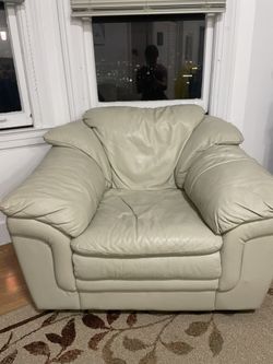 Beautiful, plush, easy white leather arm chair. Originally $499, now $50