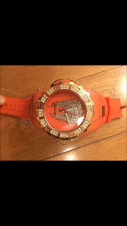 Orange watch.