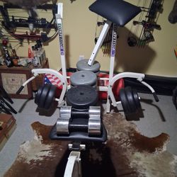 Weight Bench With Assorted Cement Weights And 2- 25lb Dumb Bells OBO
