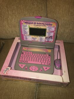 Bilingual laptop for kids $50 teaches math /spelling /games and much more$50 or best offer. English and Spanish