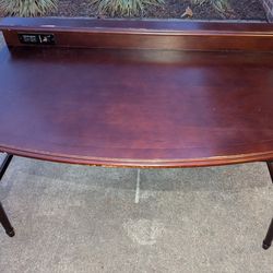 Sturdy Brown Wooden Desk with Built In Electrical Outlet