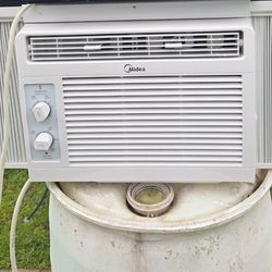 Air conditioner 5000 Btu Midea. Cools 1 rm. Used over 1 yr. Side Curtains. CASH ONLY!