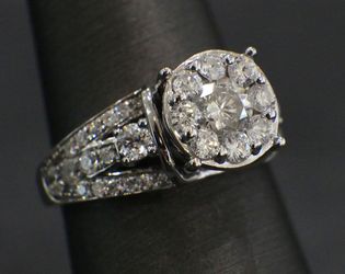 14K White Gold Cluster Diamond Engagement Ring containing approximately 1.25ctw in Round Brilliant Cut Diamond
