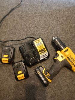 DeWalt 12v max drill plus three batteries plus charger 22v/20v lithium ion