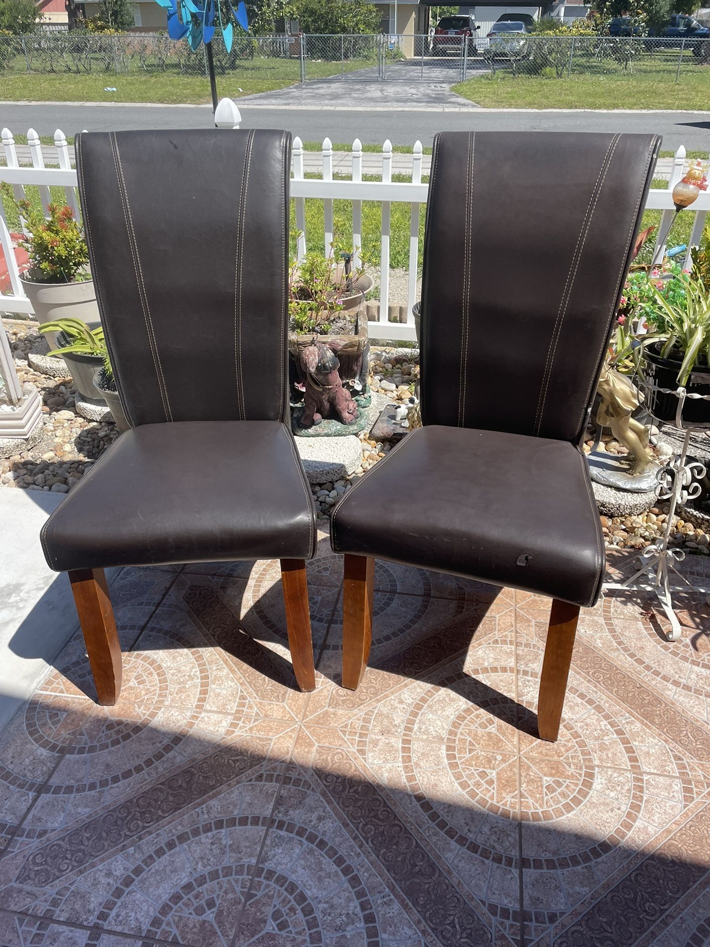 two acceptable and comfortable chairs, one has a few small chips but nothing important and very clean and super strong
