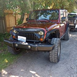 2009 Jeep Wrangler Four-door V6 3.8 30,000 Miles On The Engine The Rest Of Us Got 200,000 On It Runs And Very Beautiful Inside And Out