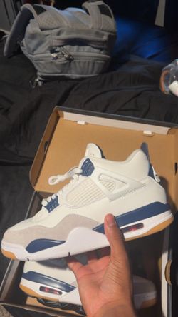 Navy blue Jordan 4s
