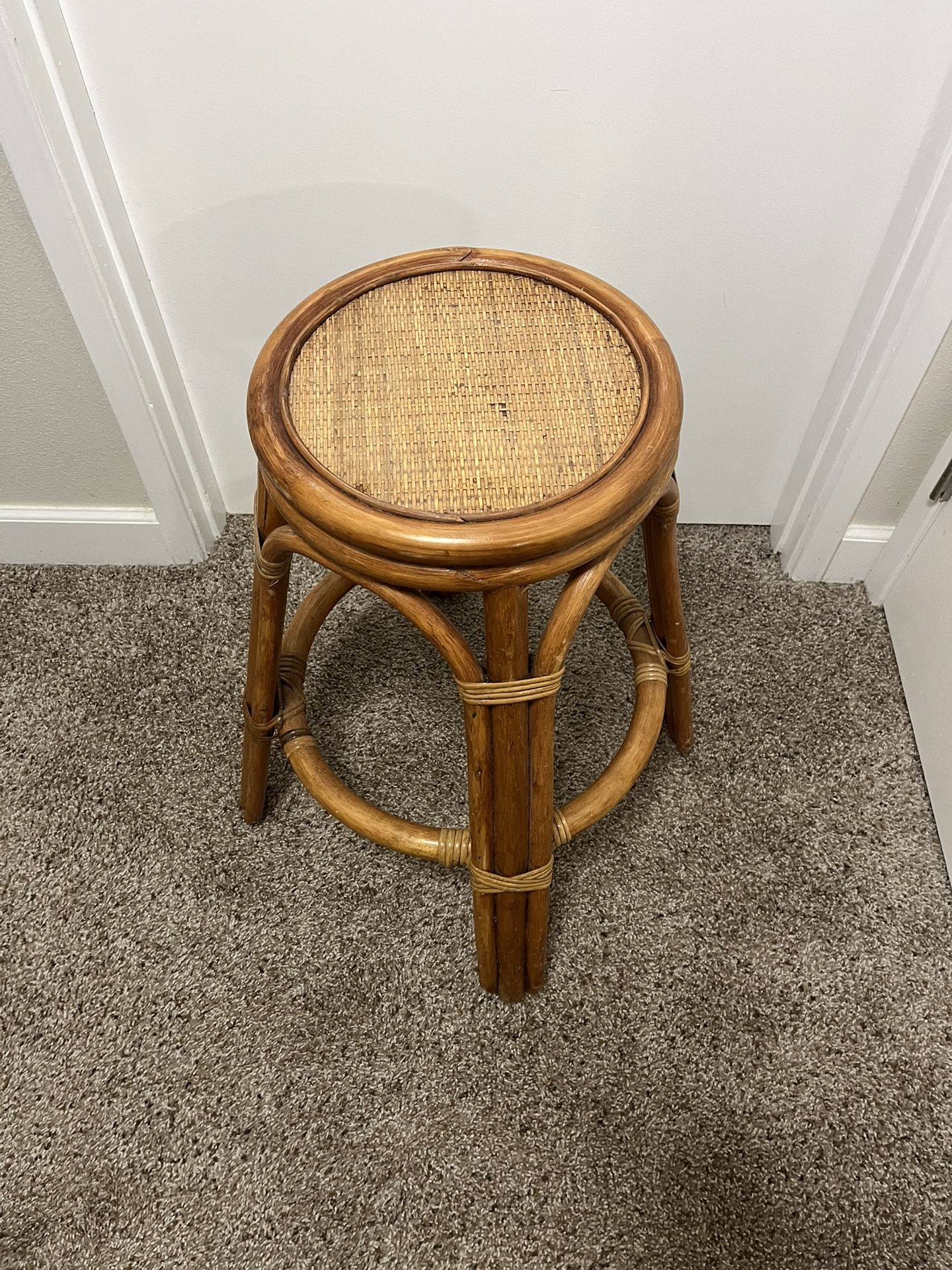 mid-century modern style bentwood rattan and woven cane stool or ottoman.