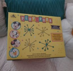 Disney  Set Of 4 Mickey  Mouse Fireworks Set. Play In The Park. Four retro-inspired metal starburst firework wall decorations.    .