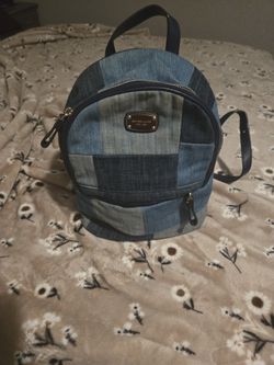 Michael Kor Denim Vintage Backpack  In Really Good Condtion.
