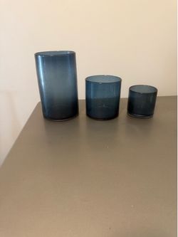 Blue glass candle jars