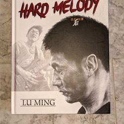 Hard Melody Hardcover by Lu Ming. (Guitarist for Nubeer)
