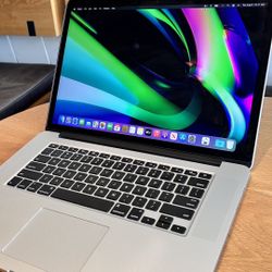 Apple MacBook Pro with 15” Retina Display quad core intel i7 processor 16GB RAM 256GB FLASH STORAGE SSD $345