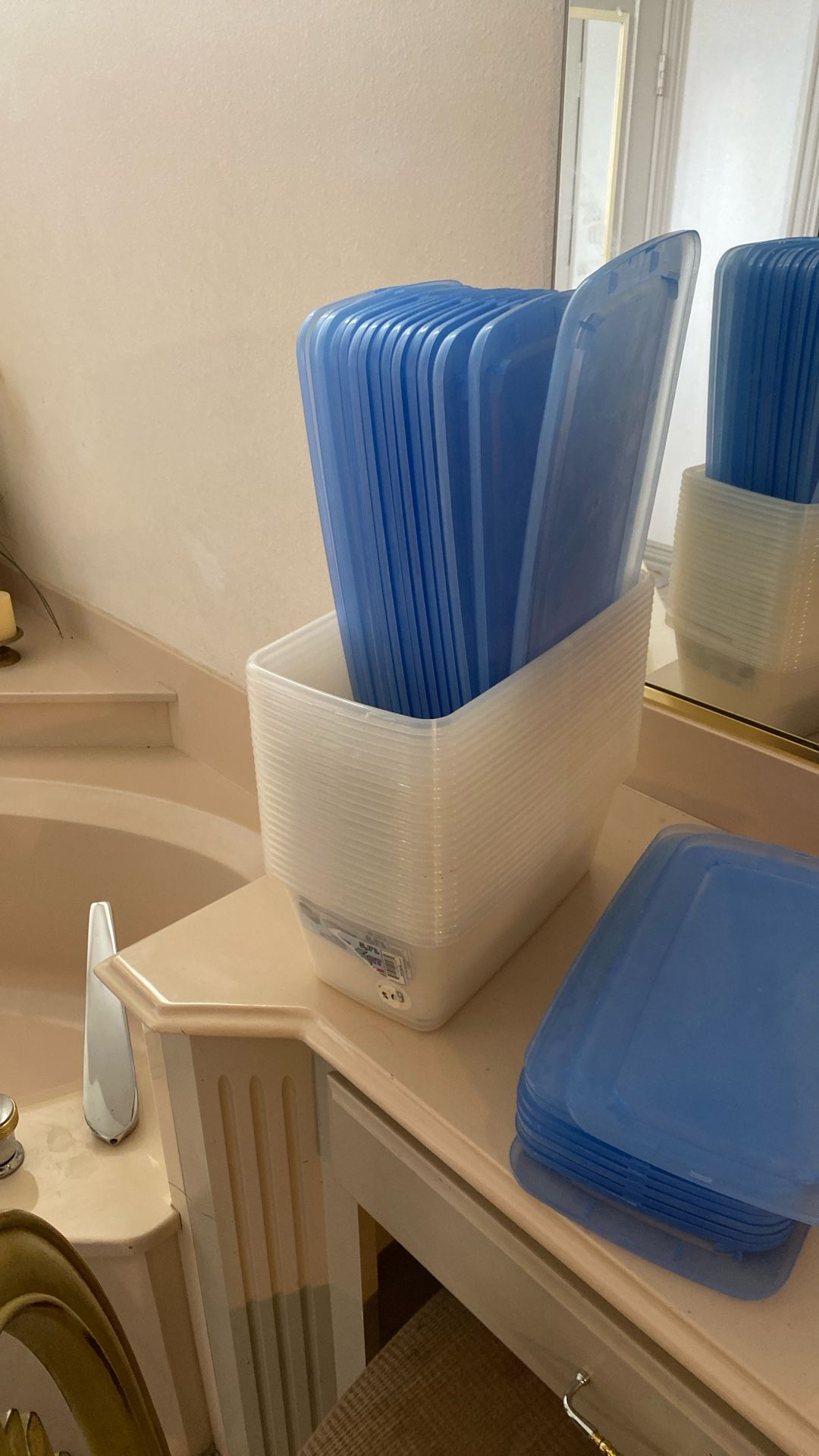 24 plastic containers you could put shoes in there you could put little objects