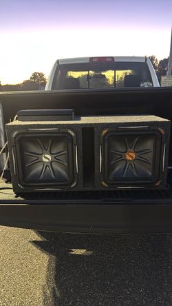 two Kicker Solo-Baric square subwoofers in a custom dual-subwoofer box