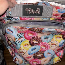 Tilami Rolling Backpack