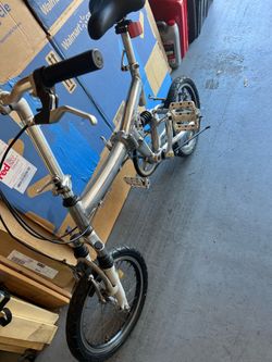 All aluminum fold away kids bike