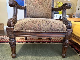 Two large solid living room chairs