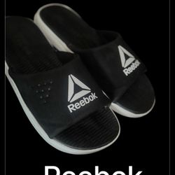 Woman’s  Reebok Slides Back & White Size 9 