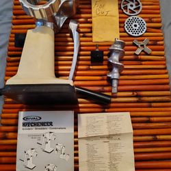 Vintage Rival Grind-O-Mat 303 Meat Grinder Food Chopper Grind-O-Matic. Is a little miscolored due to the age. Other then that is new condition 