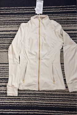 White lululemon jacket 8,10,12