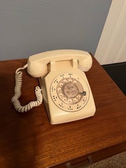 Vintage Mid-century telephone table with old telephone