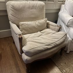 White accent chair with wood