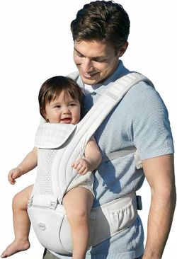 Ergonomic baby carrier with a built-in hip seat is white and features the HBR brand logo. It has air-padded shoulder straps designed for weight distri