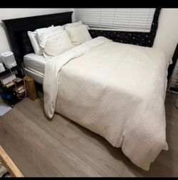 Queen size bed frame with box spring and mattress