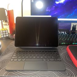 Apple IPad Air (5th gen) with apple Magic Keyboard and apple Pencil (2nd gen)